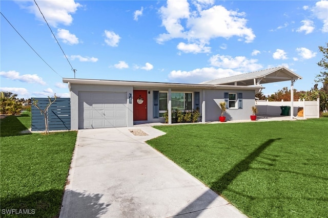 ranch-style home with a front lawn and a garage