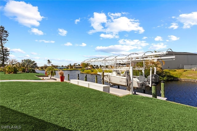 view of dock featuring a water view and a lawn