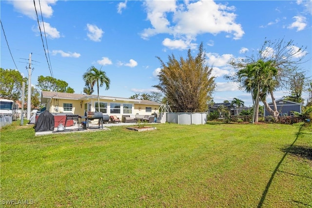 11831 Iona Rd, Fort Myers, FL 33908 - view of yard with a patio area and outdoor lounge area