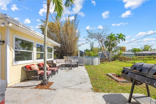 view of yard featuring an outdoor living space and a patio area