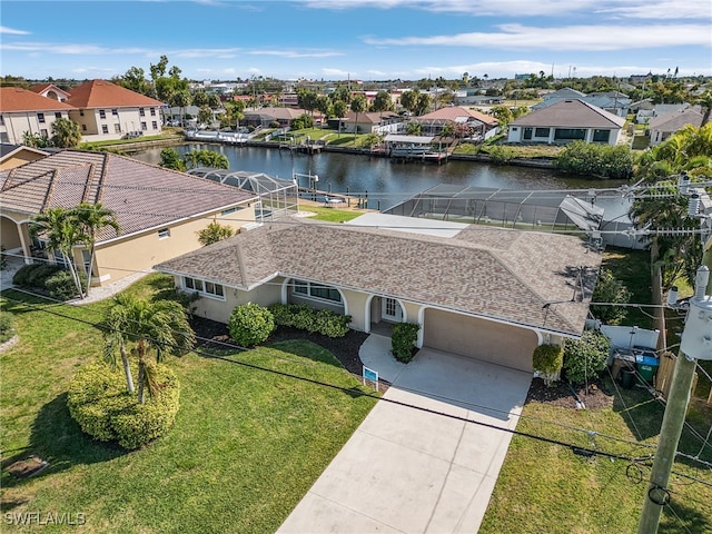 drone / aerial view featuring a water view