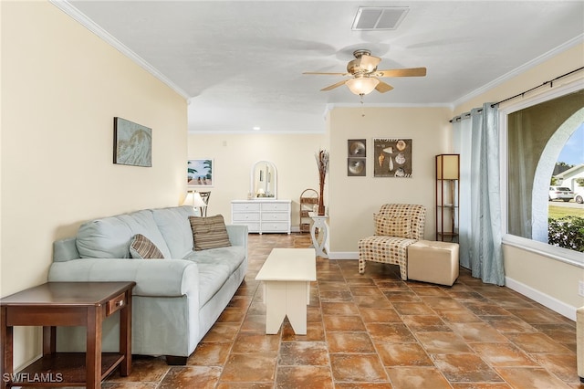 living room featuring crown molding and ceiling fan