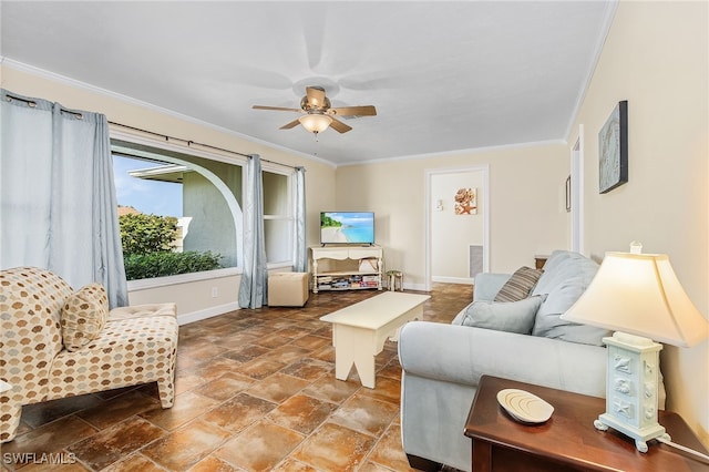 living room with ceiling fan and crown molding