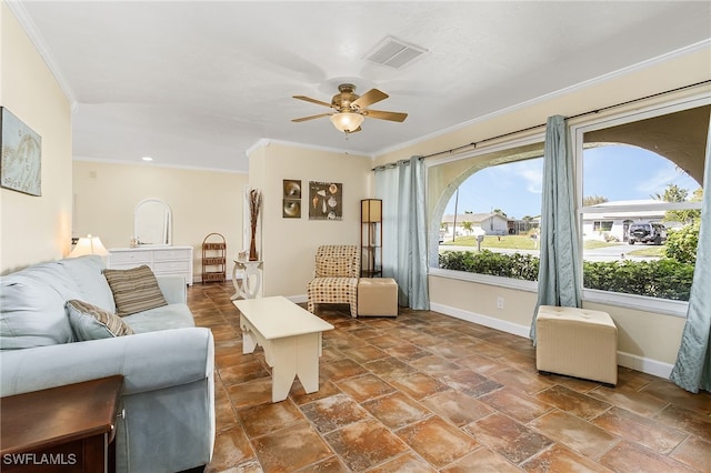 living room featuring crown molding and ceiling fan