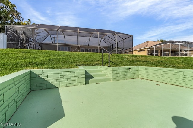 view of patio / terrace with glass enclosure