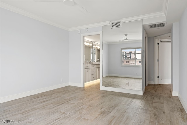 unfurnished room with ornamental molding, ceiling fan, and light hardwood / wood-style floors