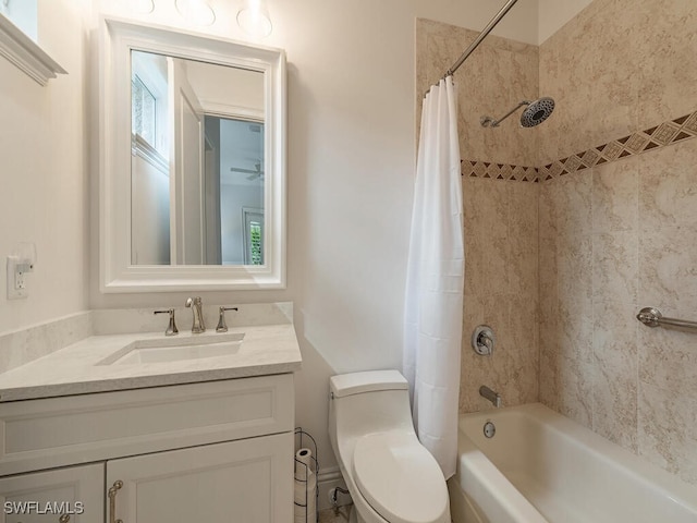 full bathroom with vanity, toilet, and shower / tub combo with curtain