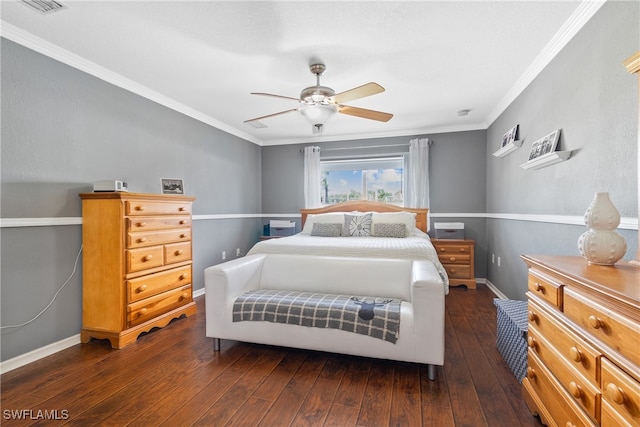 bedroom featuring dark hardwood / wood-style flooring, ceiling fan, and crown molding