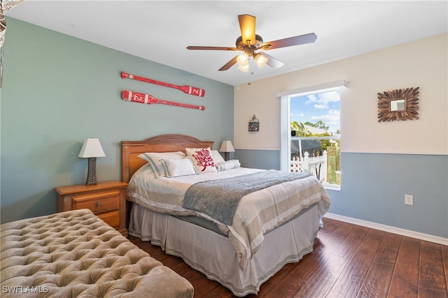 bedroom featuring ceiling fan and dark hardwood / wood-style flooring