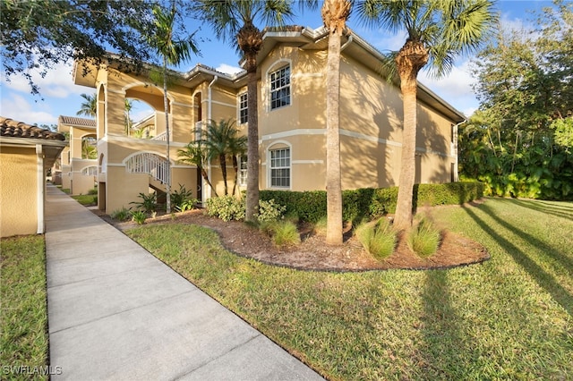 exterior space featuring a front lawn