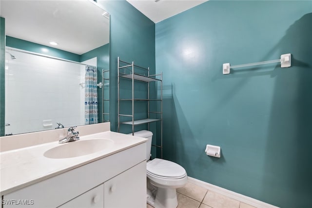 bathroom with vanity, toilet, a shower with shower curtain, and tile patterned flooring