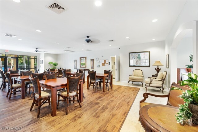 dining area featuring ceiling fan and light hardwood / wood-style flooring