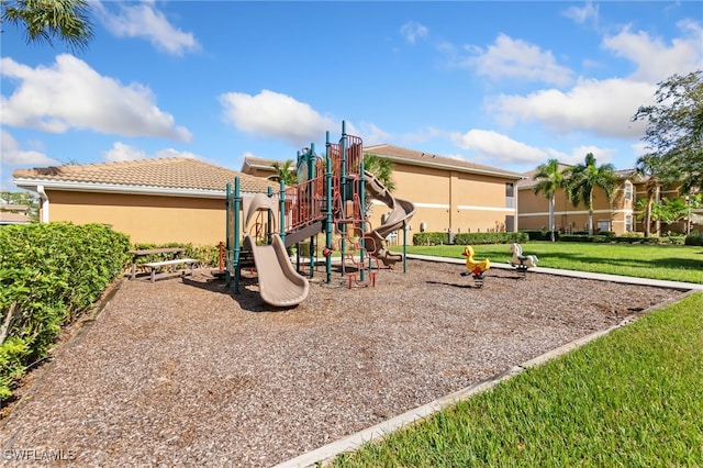 view of play area featuring a yard