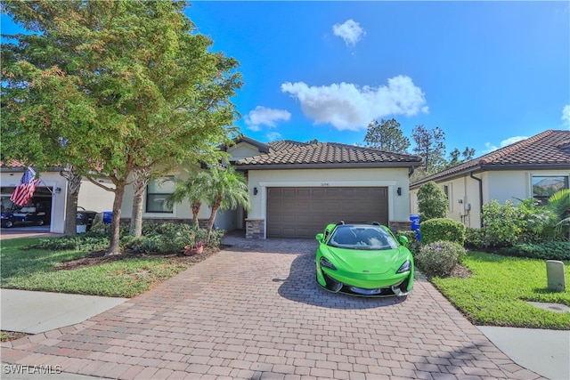 view of front of home with a garage