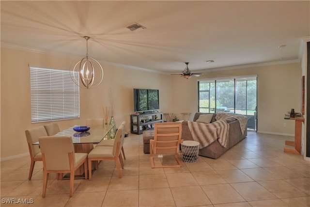 dining area with ornamental molding, light tile patterned floors, and ceiling fan with notable chandelier