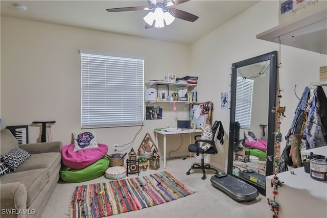 office with ceiling fan and carpet flooring