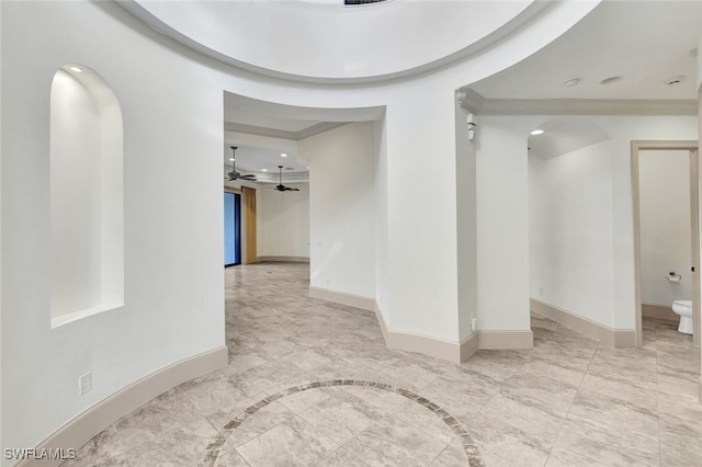 27588 River Reach Dr, Bonita Springs, FL 34134 - spare room featuring ornamental molding, arched walkways, baseboards, recessed lighting, and inlaid floor details