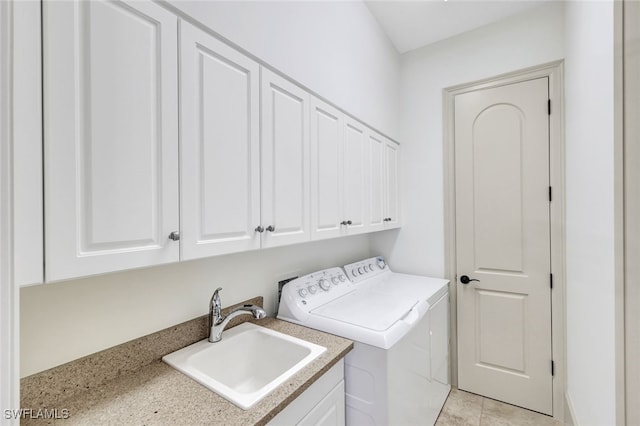 27588 River Reach Dr, Bonita Springs, FL 34134 - laundry area with cabinet space and washer and dryer