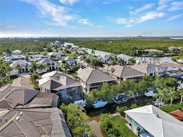 drone / aerial view with a water view