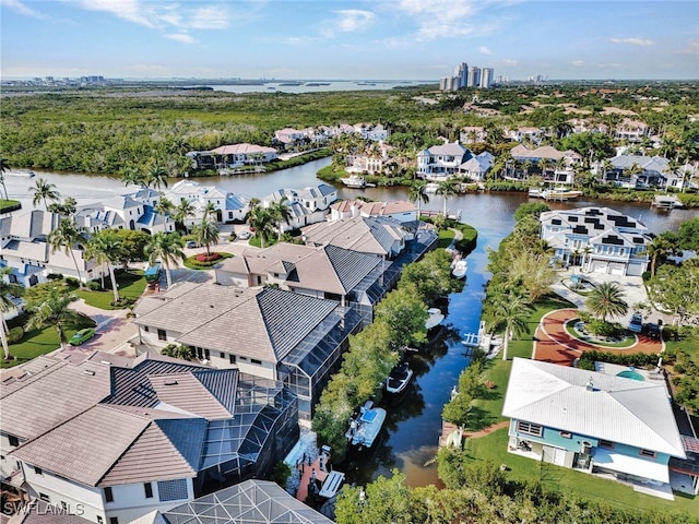 drone / aerial view with a water view