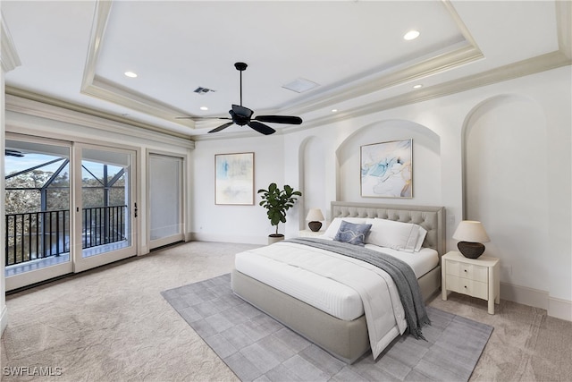 bedroom with access to outside, light colored carpet, ceiling fan, and a raised ceiling