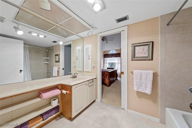 bathroom with vanity, rail lighting, tile patterned floors, and shower / bath combination with curtain