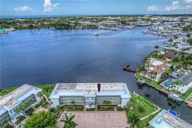 drone / aerial view with a water view