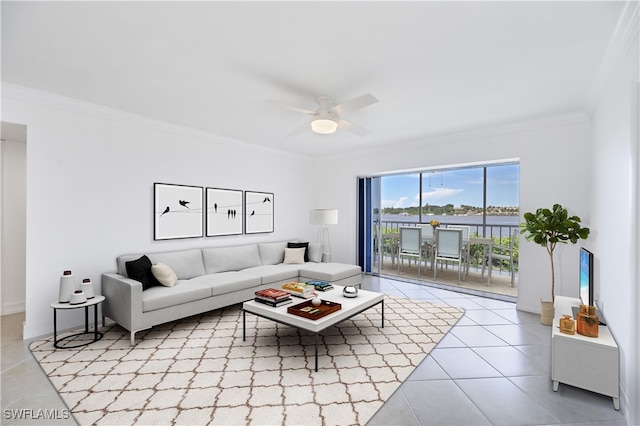 tiled living room with crown molding and ceiling fan