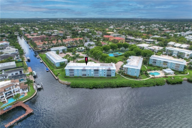 birds eye view of property featuring a water view