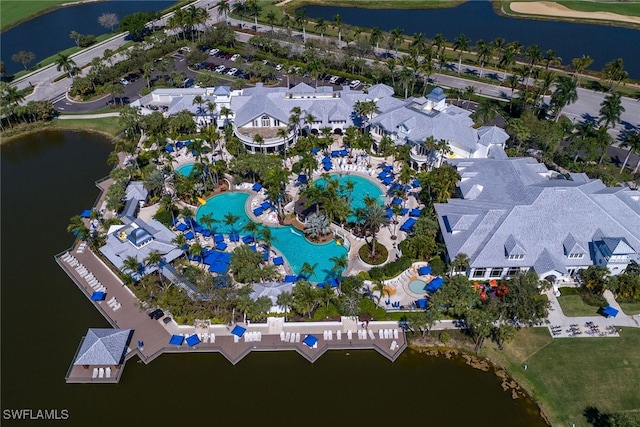 birds eye view of property with a water view