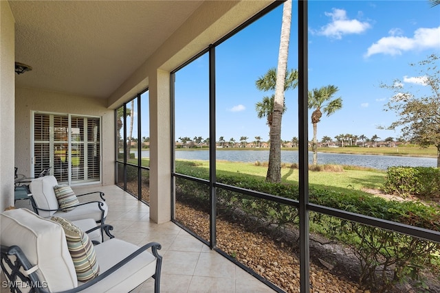 sunroom with a water view