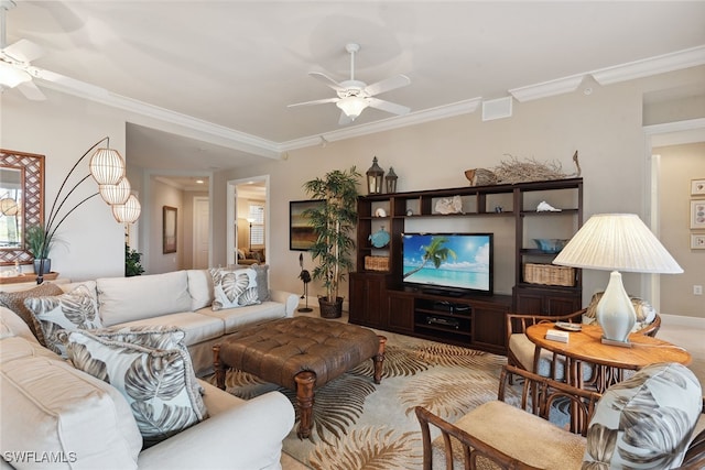 living room featuring ceiling fan, crown molding, and light carpet