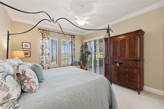 bedroom with light colored carpet, ceiling fan, and ornamental molding