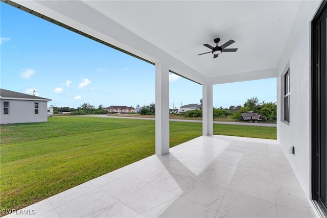 view of patio with ceiling fan