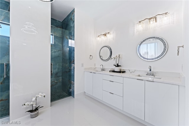 bathroom with vanity, walk in shower, tile patterned floors, and a wealth of natural light