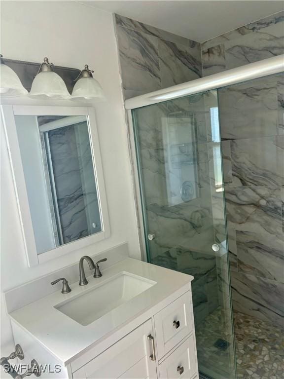 1310 Thompson St, North Fort Myers, FL 33903 - full bath with vanity and a marble finish shower