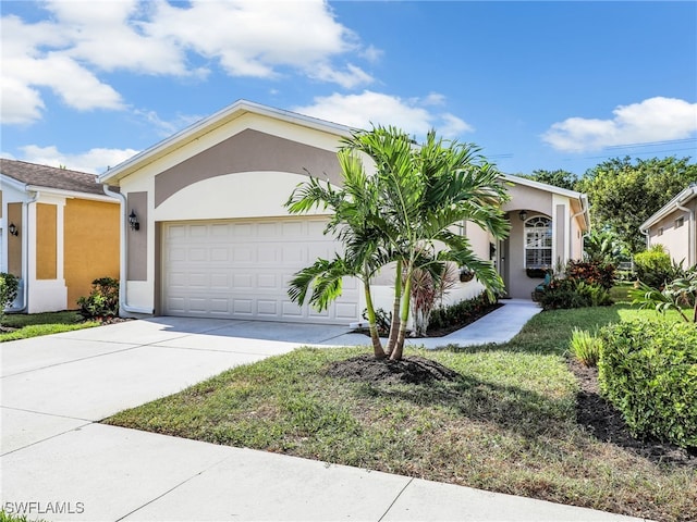 ranch-style home with a garage and a front lawn