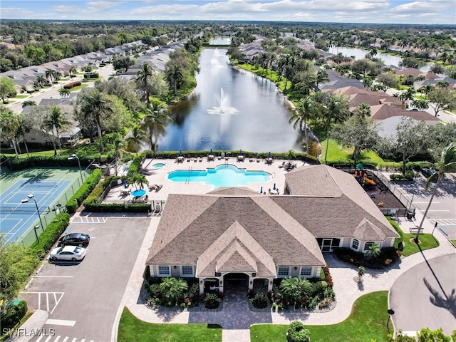 drone / aerial view with a water view