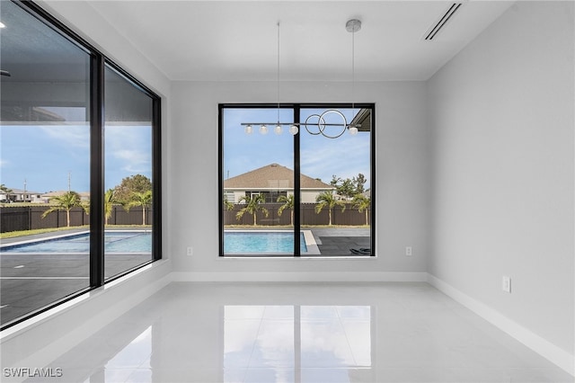 view of tiled spare room