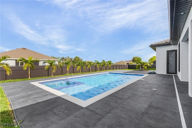 view of pool with a patio