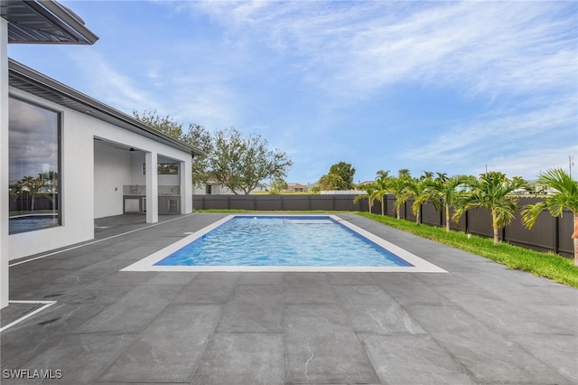 view of pool with a patio