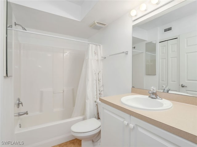 full bathroom featuring shower / bath combination with curtain, vanity, and toilet