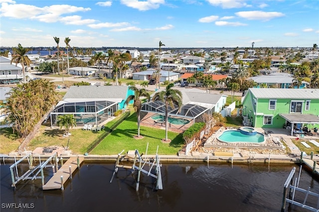 drone / aerial view featuring a water view