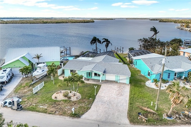 drone / aerial view featuring a water view