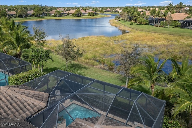 bird's eye view with a water view