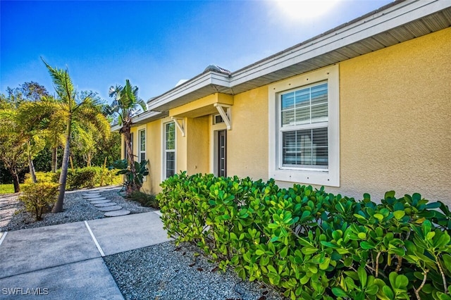 doorway to property with a patio