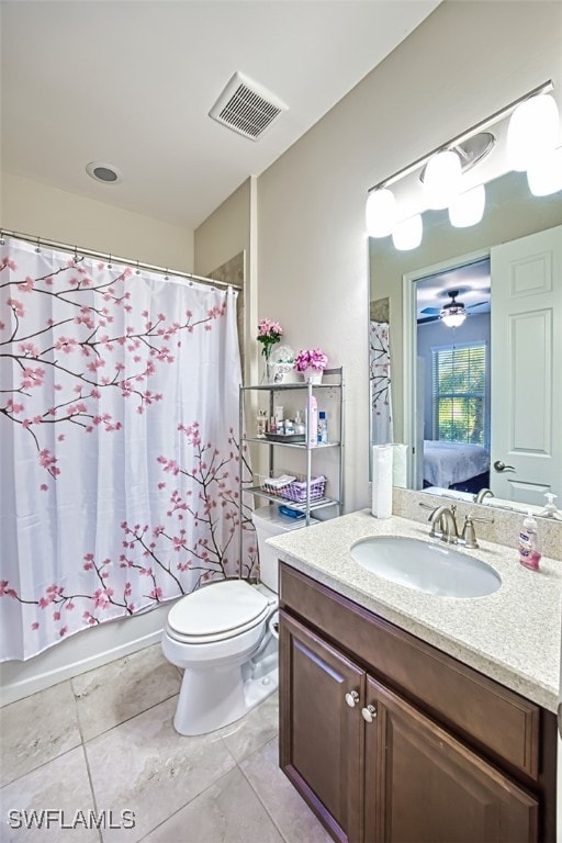 full bathroom with toilet, tile patterned flooring, vanity, ceiling fan, and shower / bath combination with curtain