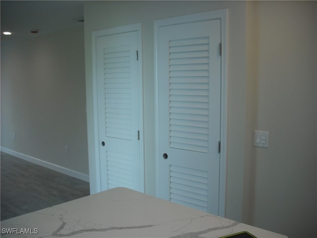 bedroom featuring dark hardwood / wood-style flooring