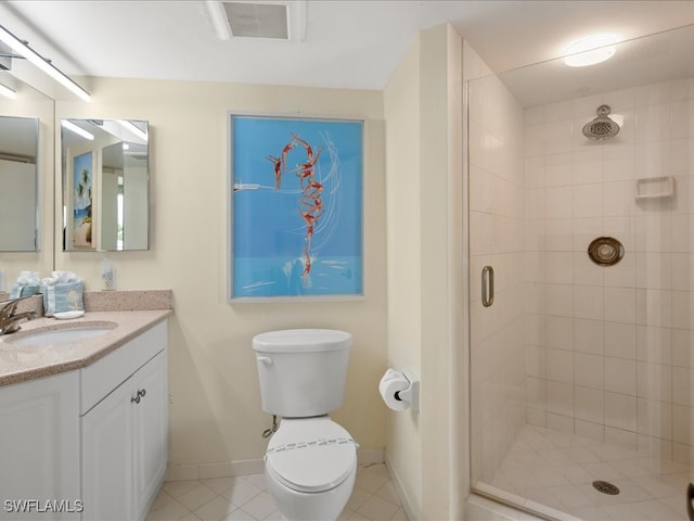 bathroom featuring walk in shower, tile patterned flooring, vanity, and toilet