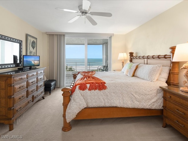 bedroom with light colored carpet, multiple windows, and ceiling fan